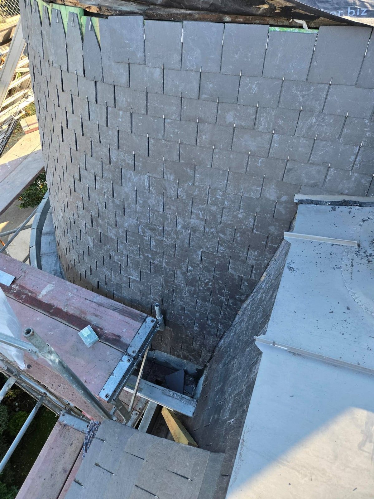 Slate cladding of a facade, work in progress