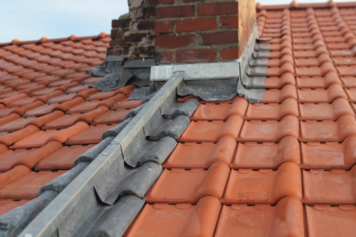 Repointed chimney with renewed flashings
