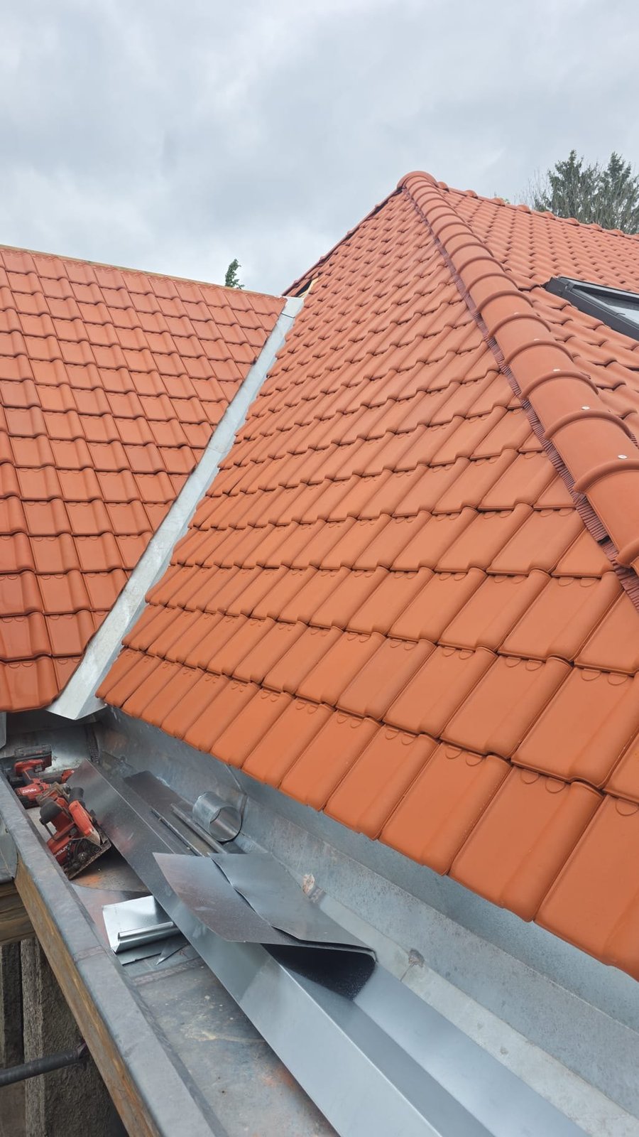 Ridge and zinc valley on a tiled roof