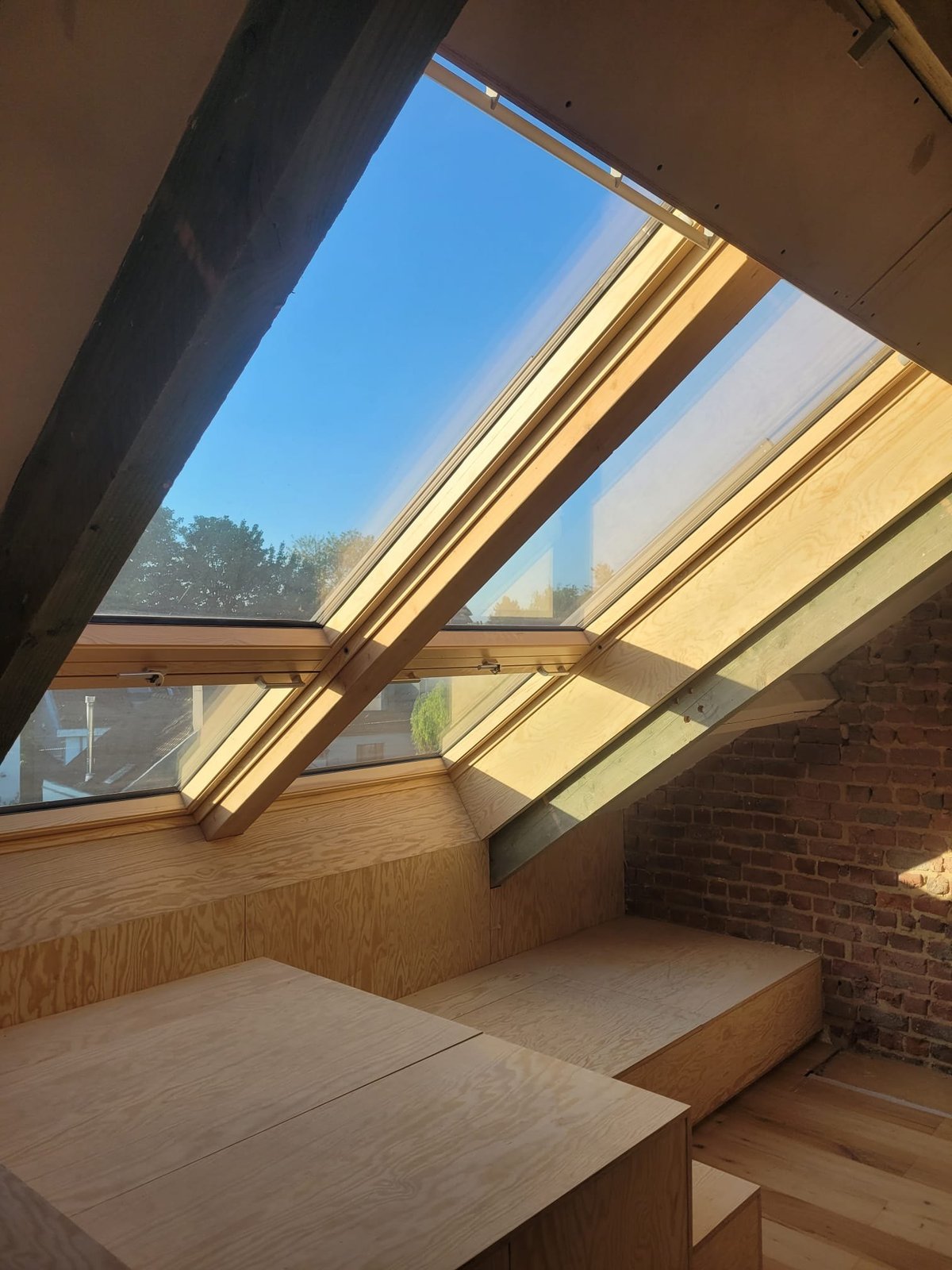 Finished Velux roof windows with timber interior finish