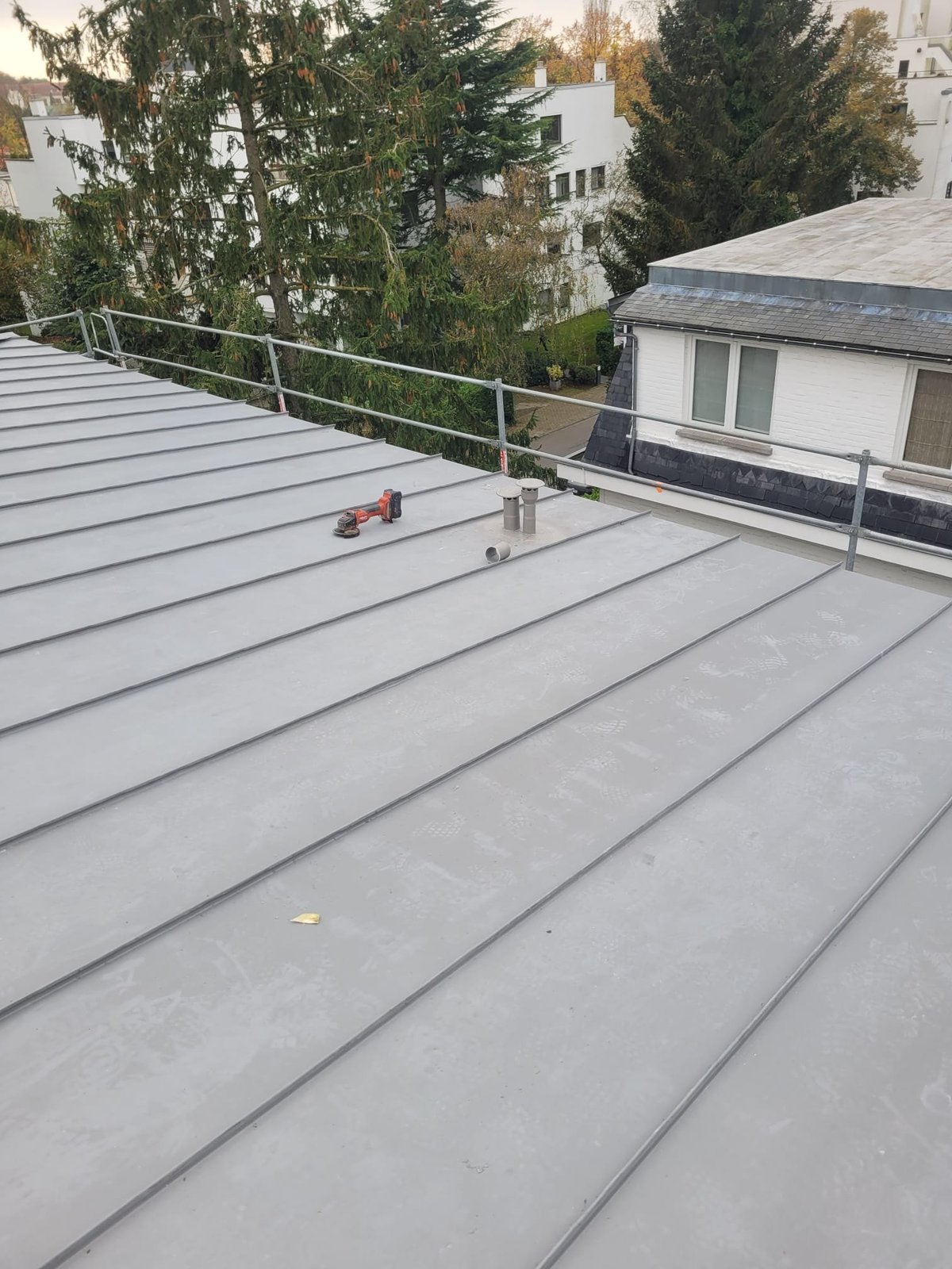 Detail of the standing seams on a zinc roof