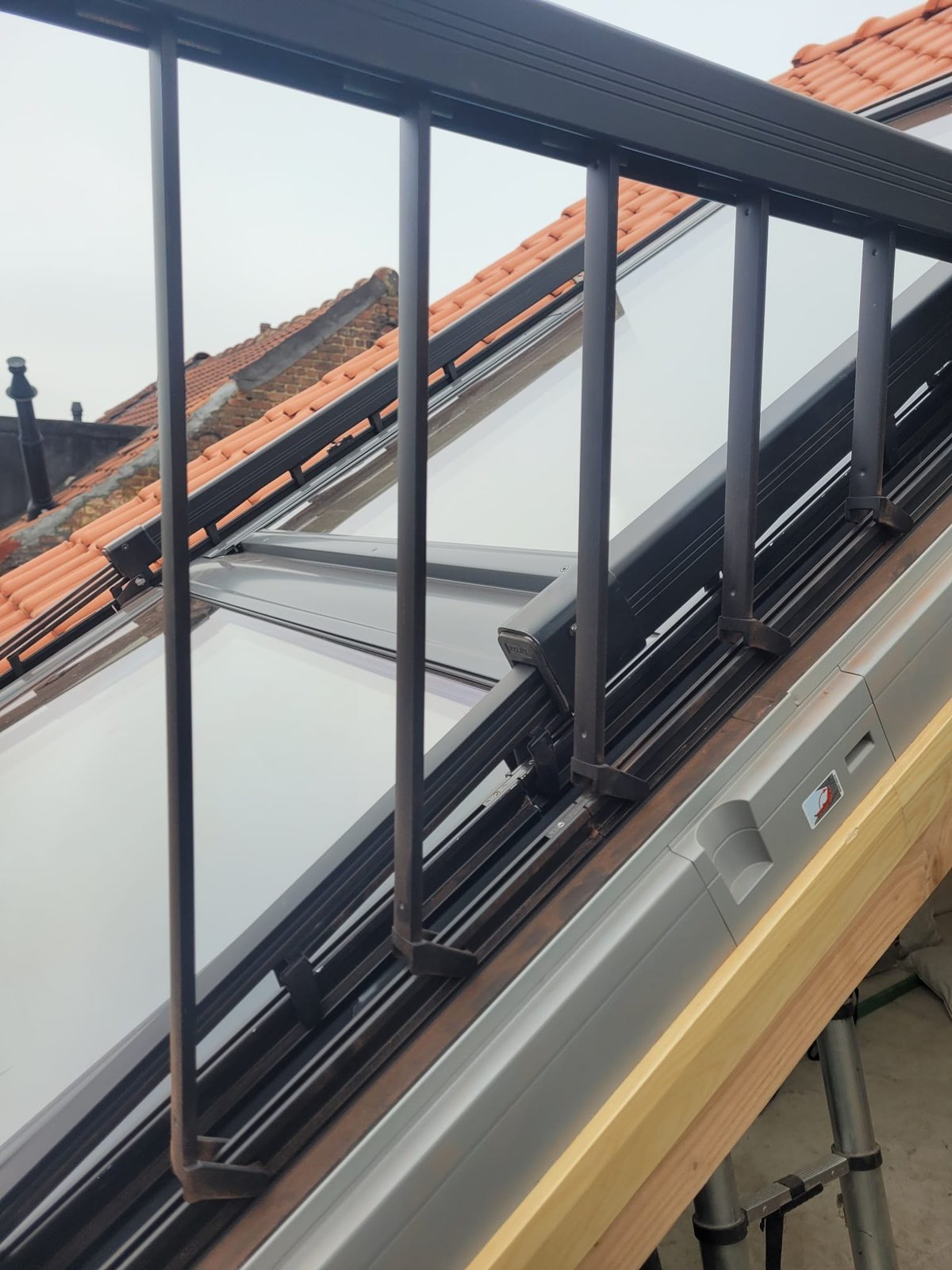 Balcony roof window with railing